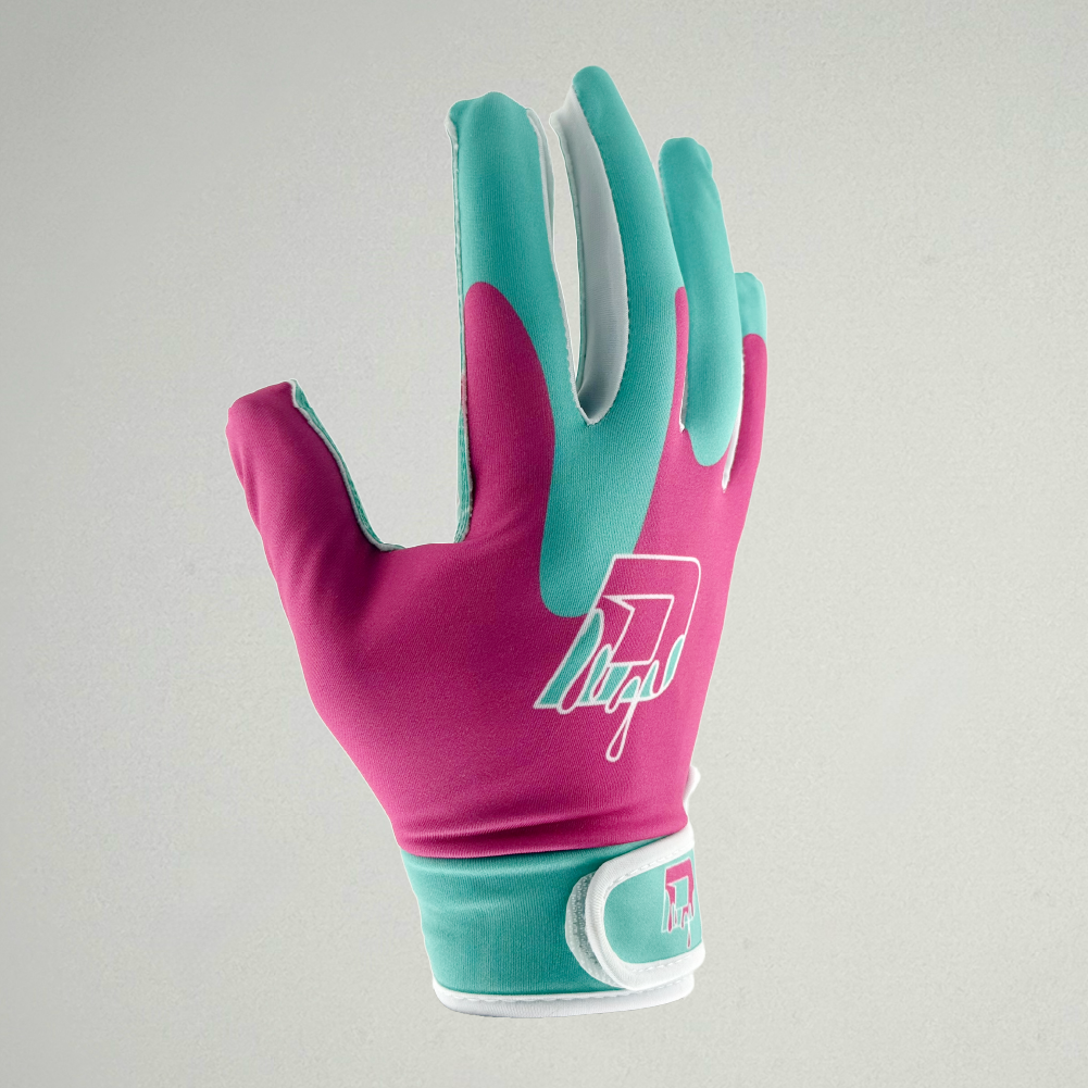 Side angle of pink and teal youth football receiver glove with grip, showing Sportz Drip logo and wrist strap.